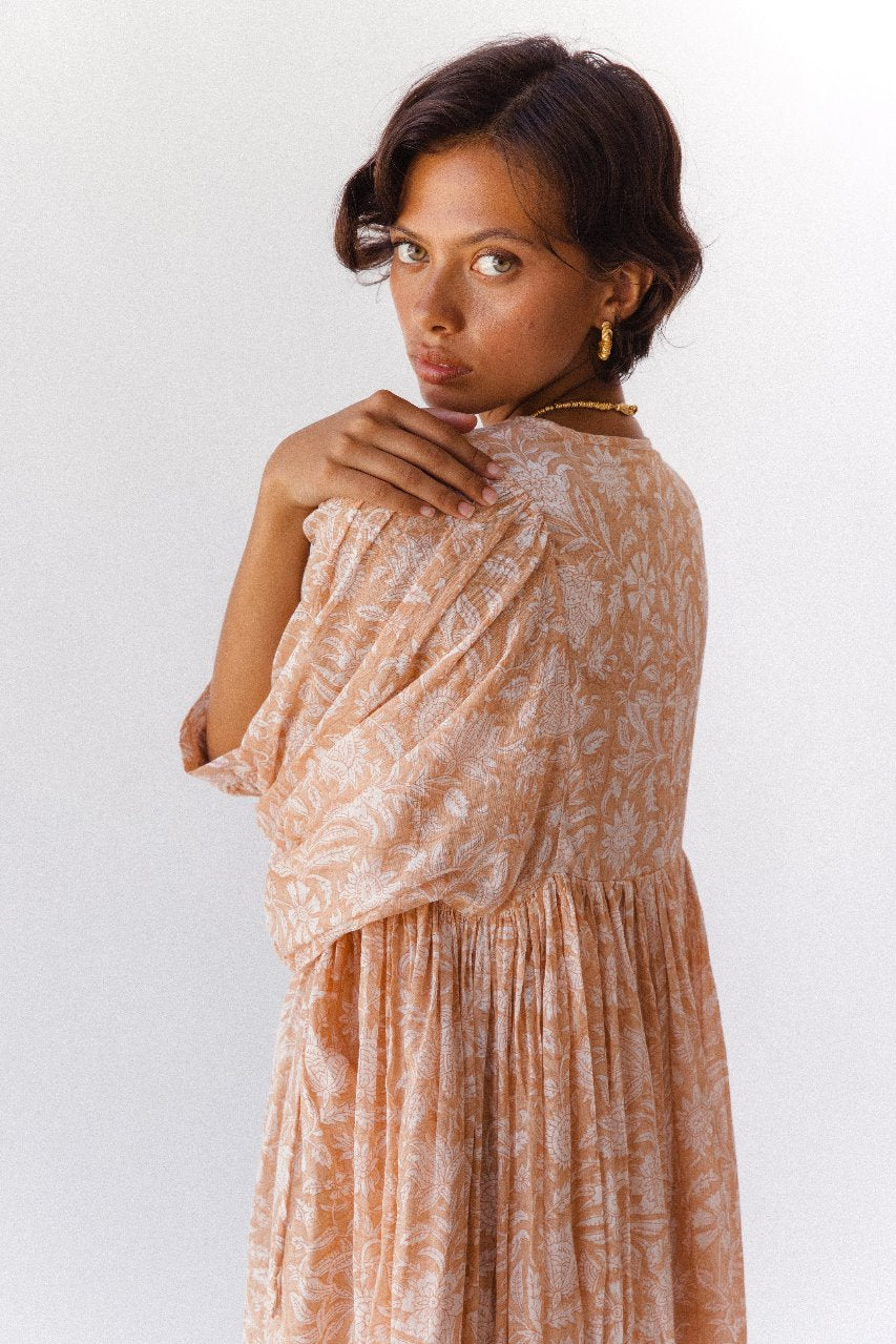 Daughters of India Kyra Maxi Dress in Apricot Blush — studio over-shoulder close-up, floral hand screen print detail