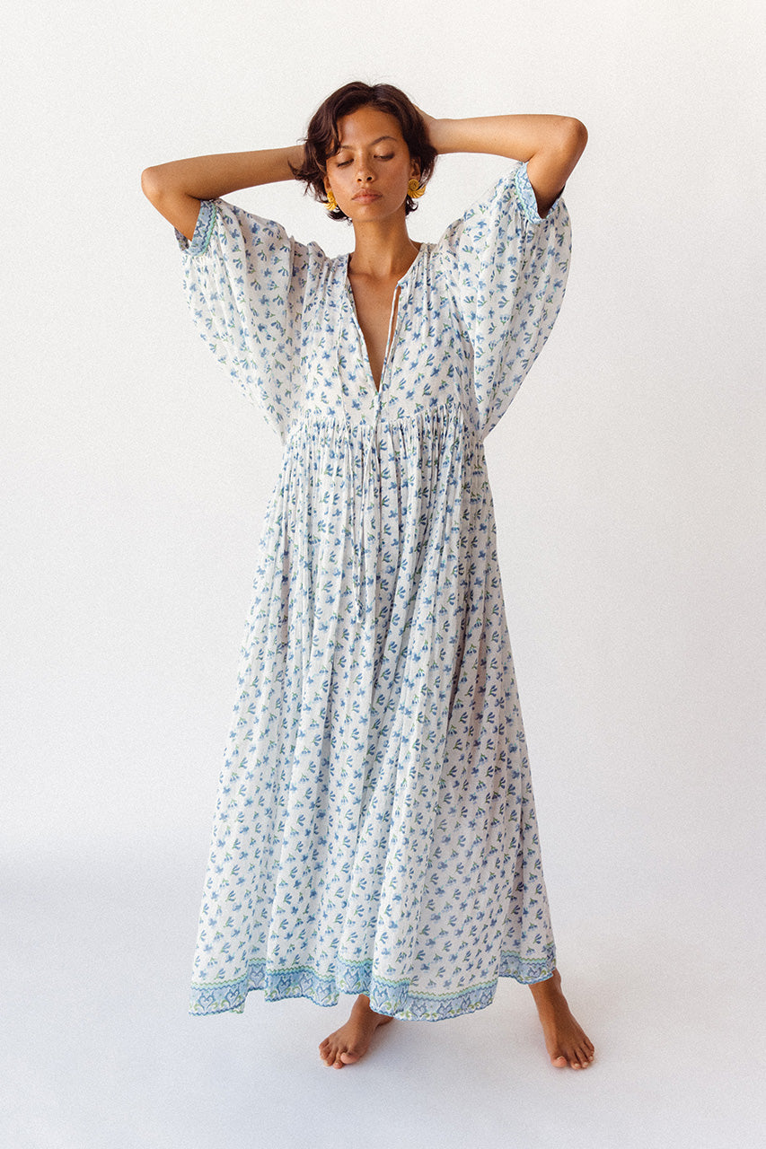 Daughters of India Kyra Maxi Dress in Azure — studio arms behind head, full length blue floral block print cotton